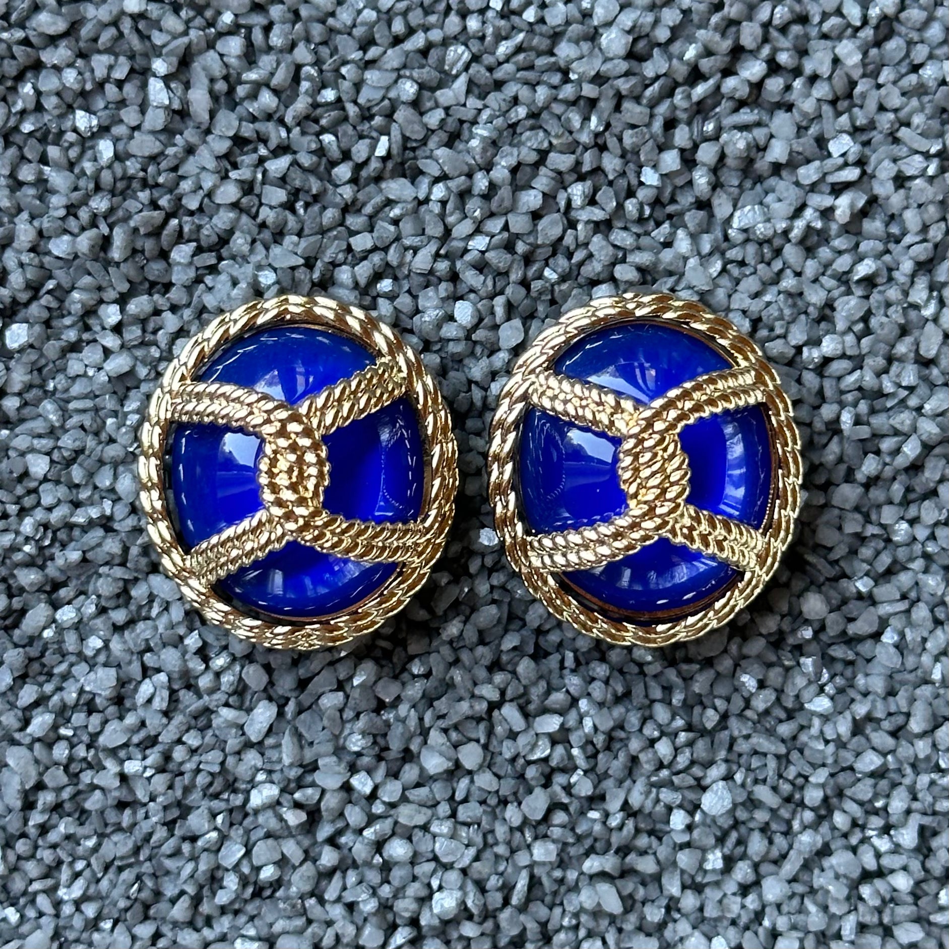 Colored Ovals with Gold Filigree Knot
