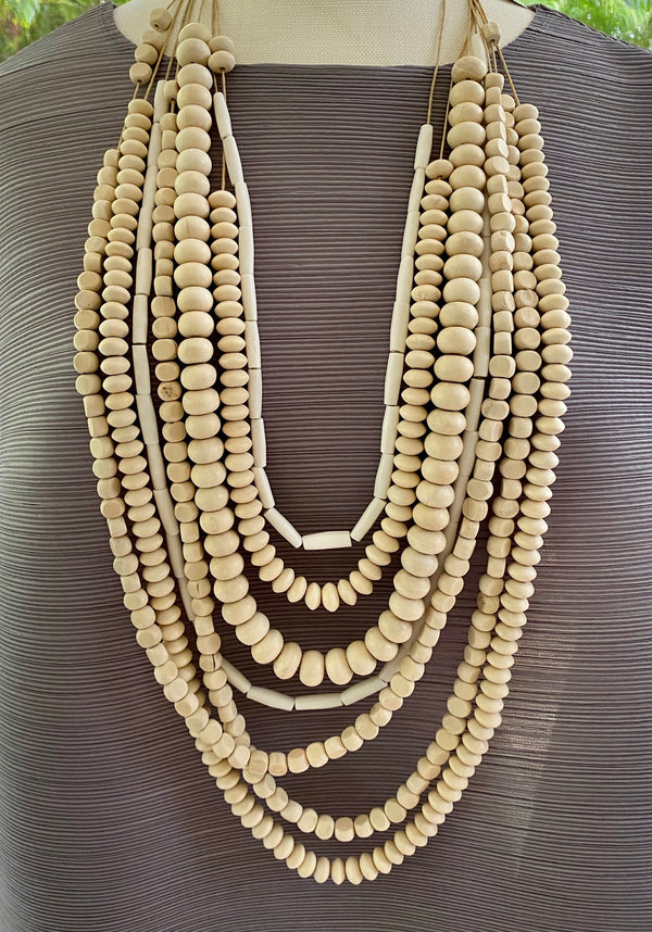 Rondell Cream Multi Strand Different Sized Beads